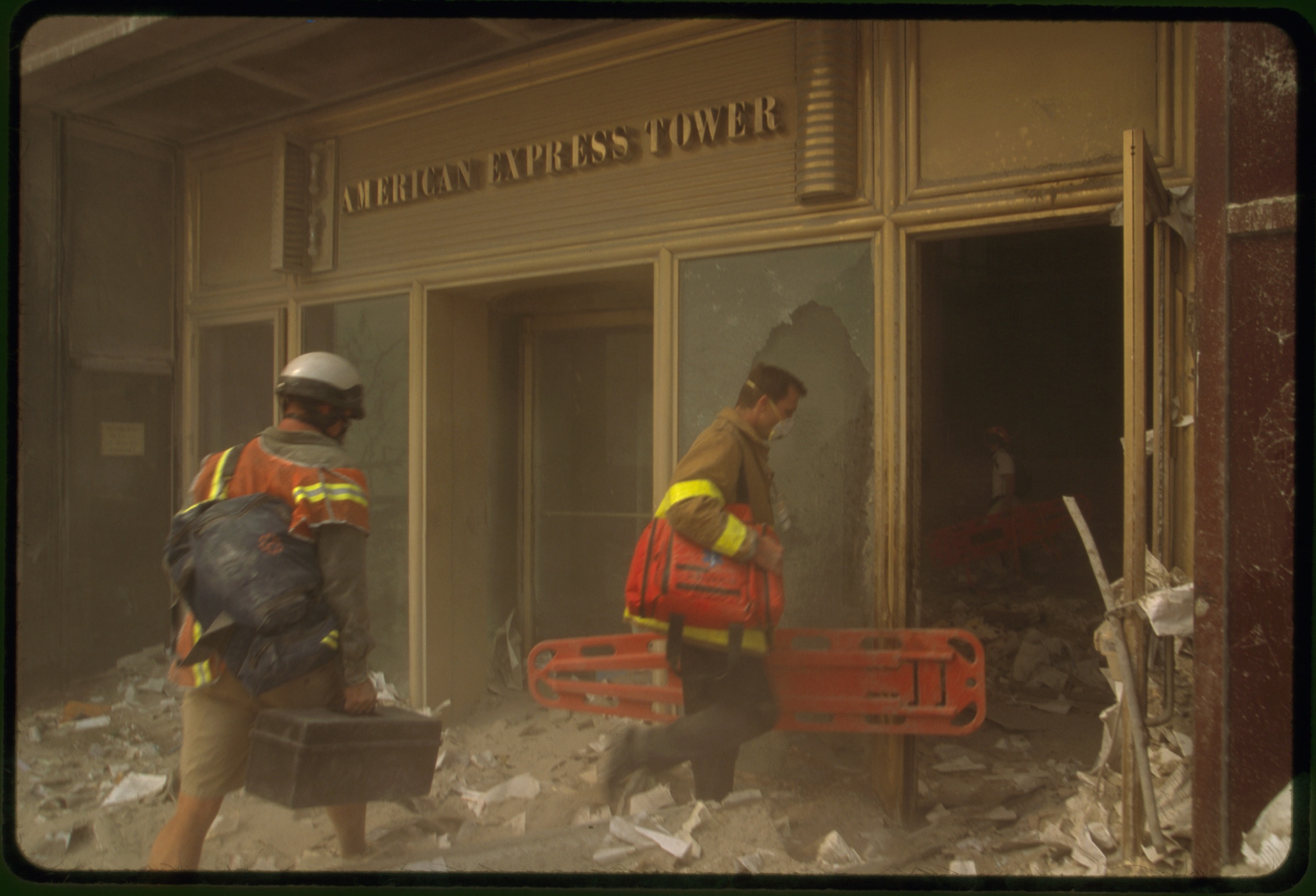 Two rescue workers entering the American Express Tower following September 11th terrorist attack on World Trade Center, New York City