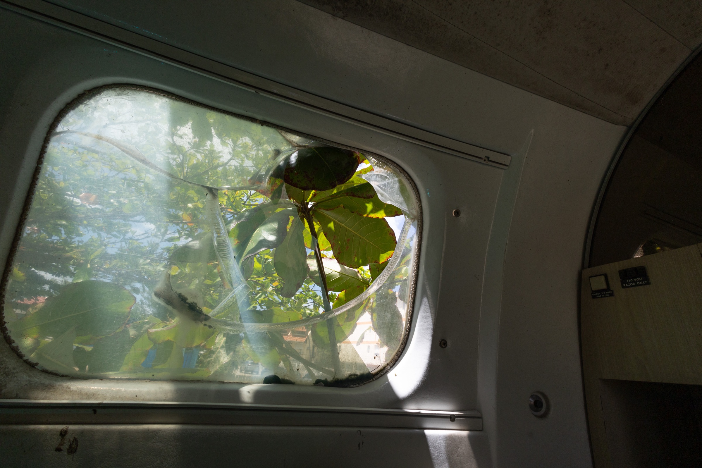 Damaged cockpit window of Hurricane Irma aircraft wreck