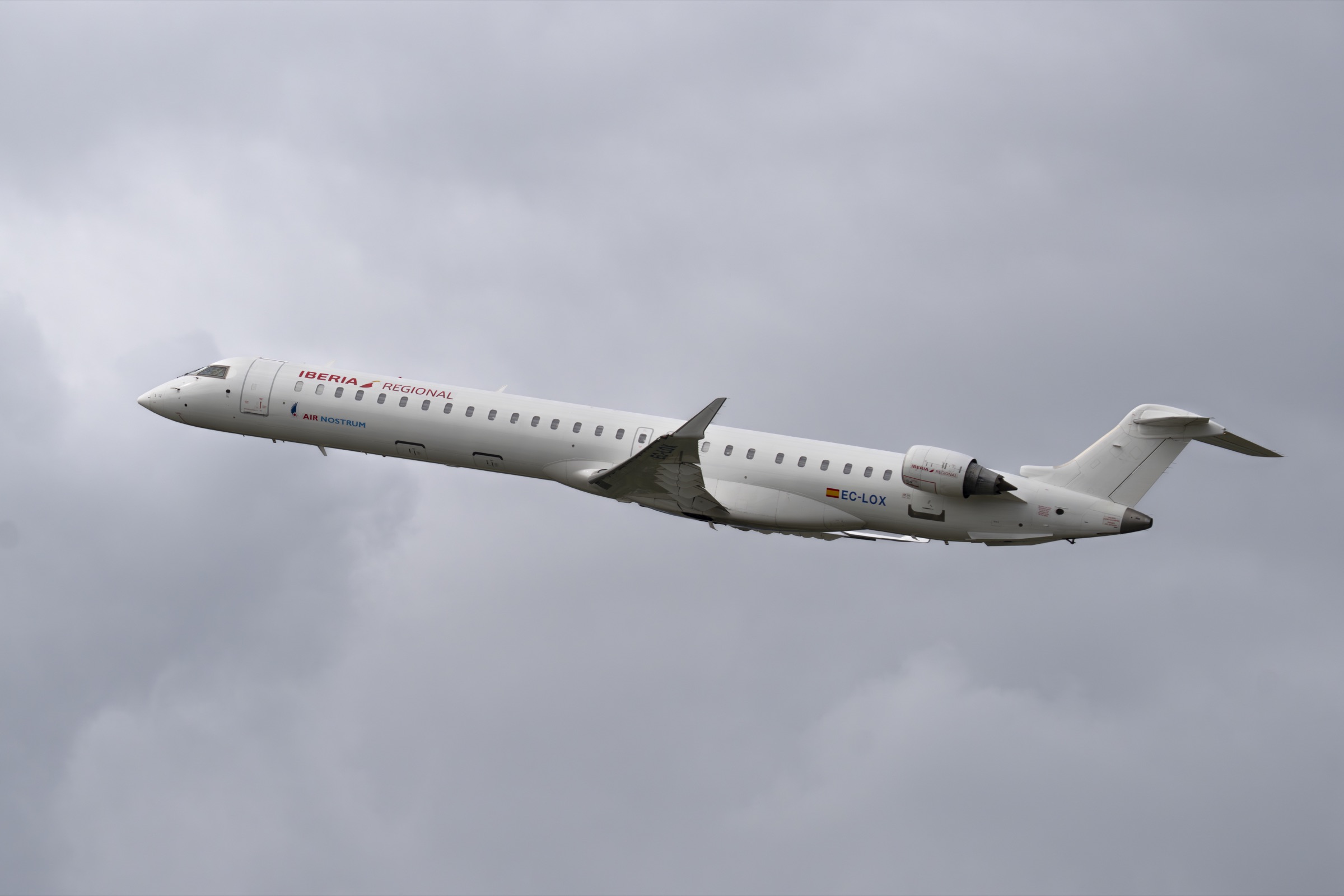 Airplane photographed in the sky over Geneva