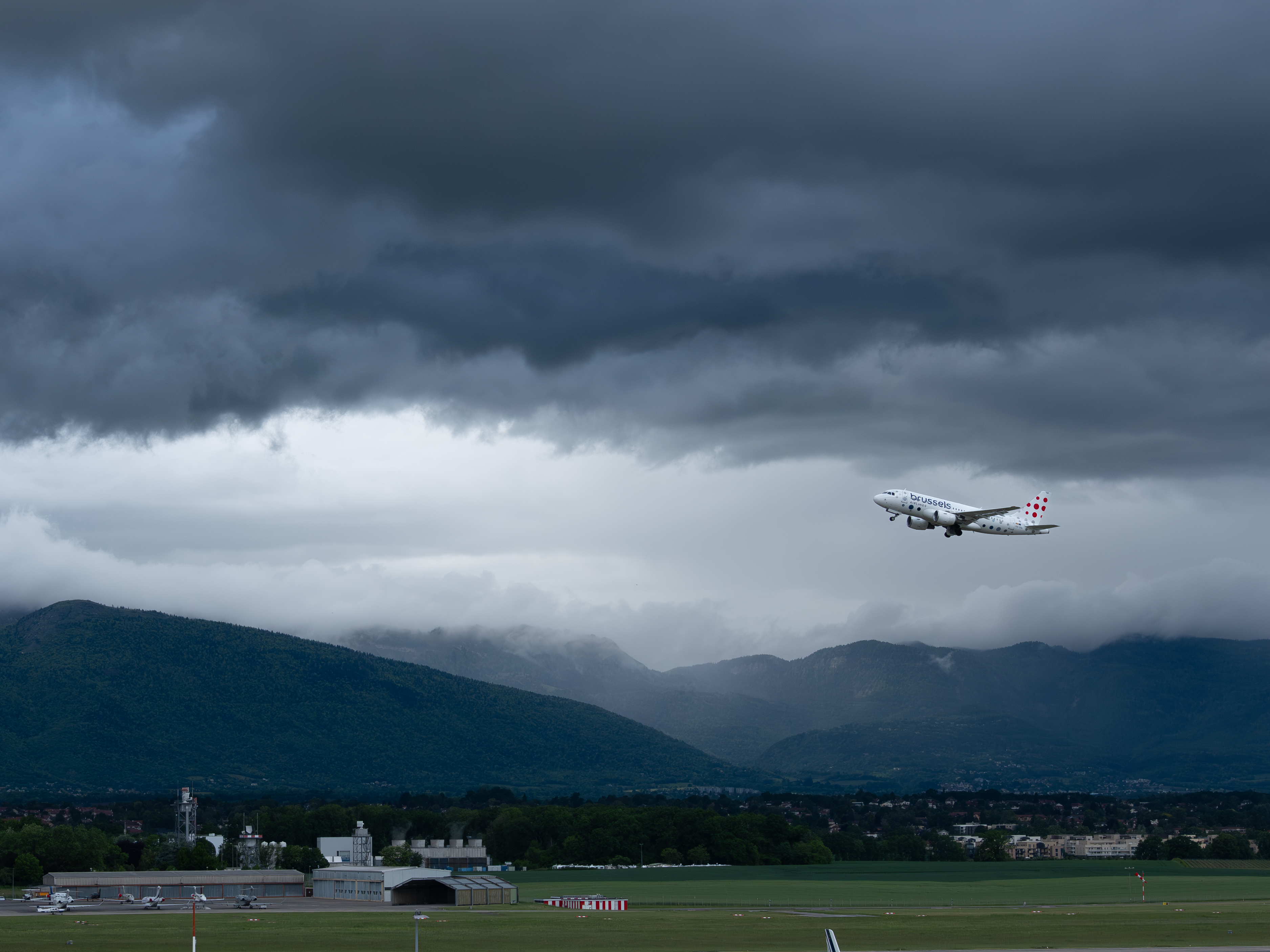 Airplane in the sky of geneva